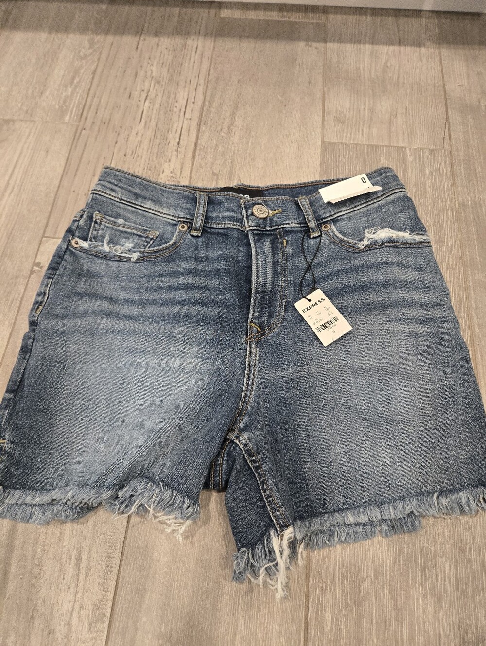NWT EXPRESS midi high rise raw hem distressed jean shorts Size 0